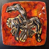 a ceramic plate with a horse on it